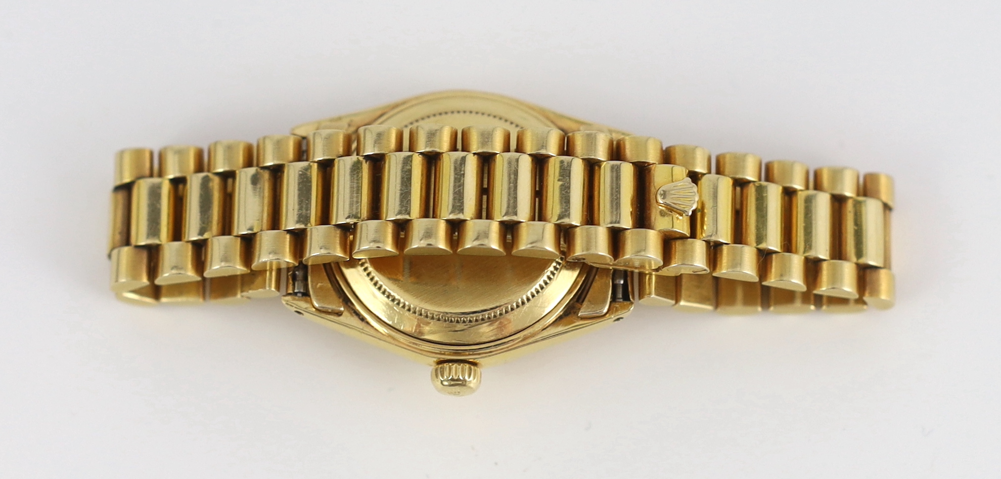 A lady's early 1970's 18ct gold Rolex Oyster Perpetual Datejust wrist watch, with diamond dot numerals, on an 18ct gold Rolex bracelet, with deployment clasp